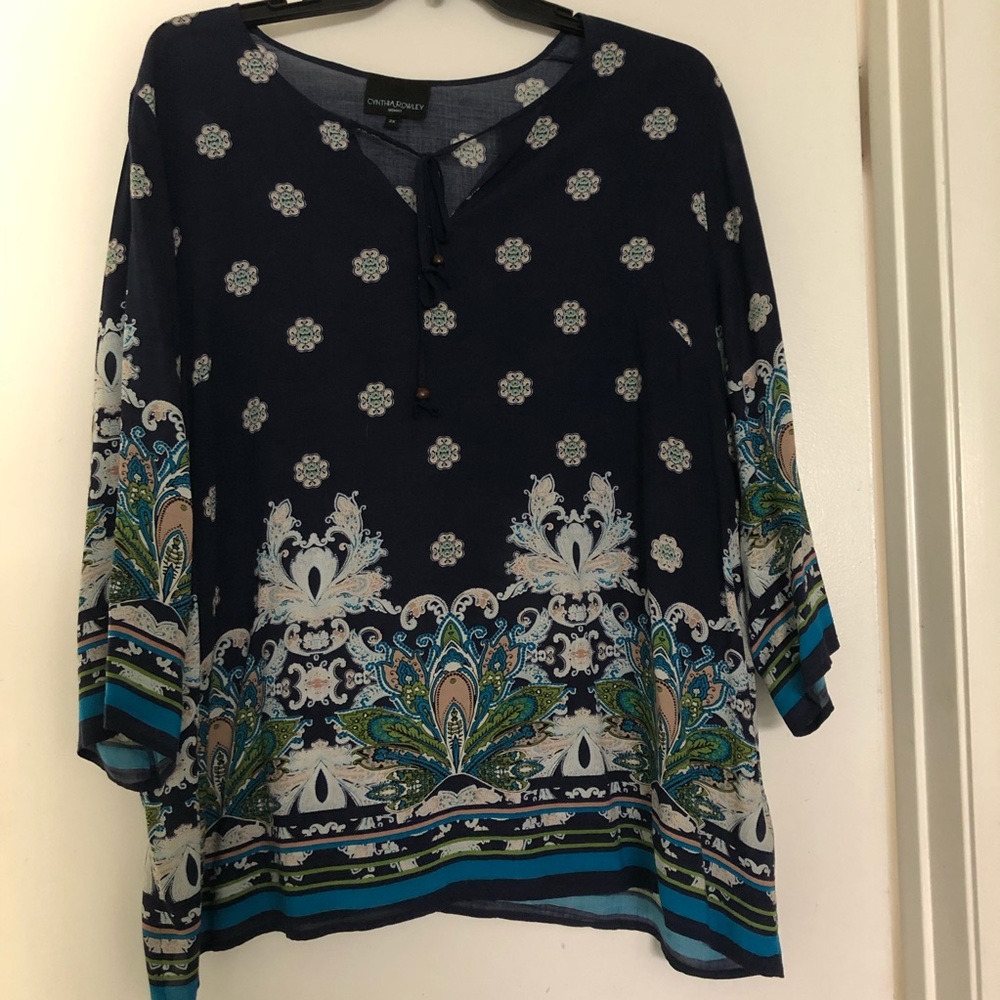 Cynthia Rowley Women’s Blouse. 3/4 Sleeves. 100% Rayon. Tie detail at neckline.